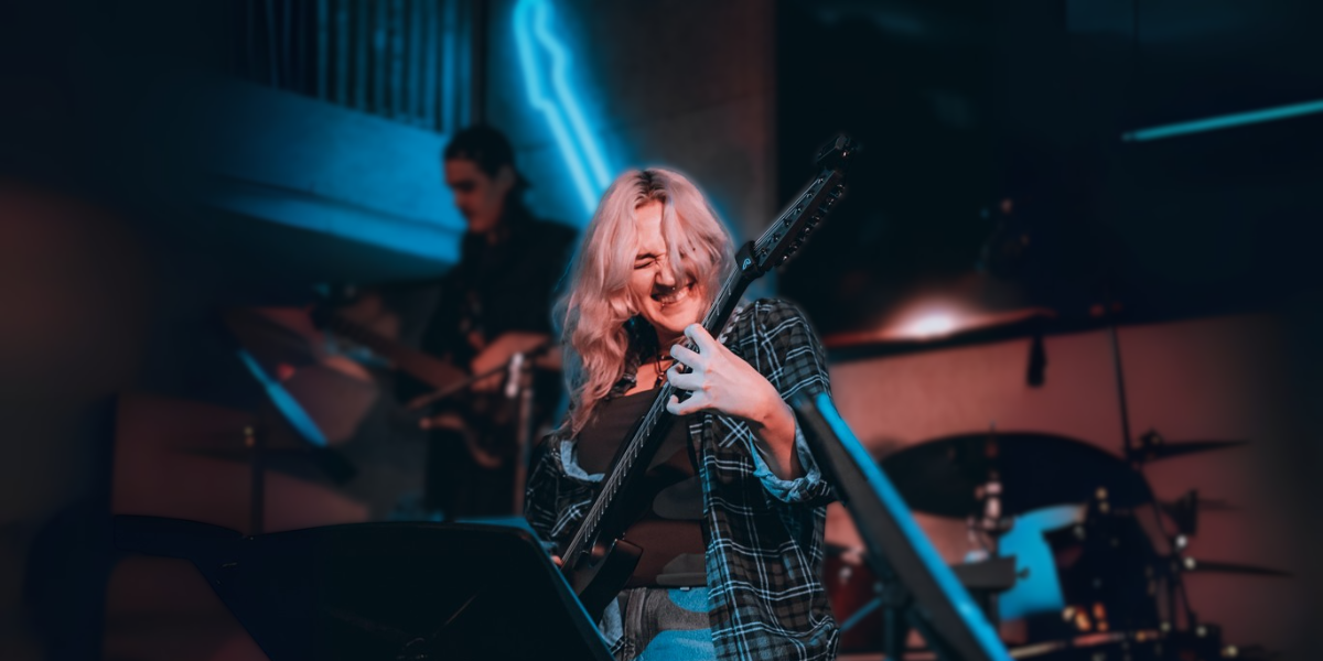 Person playing guitar